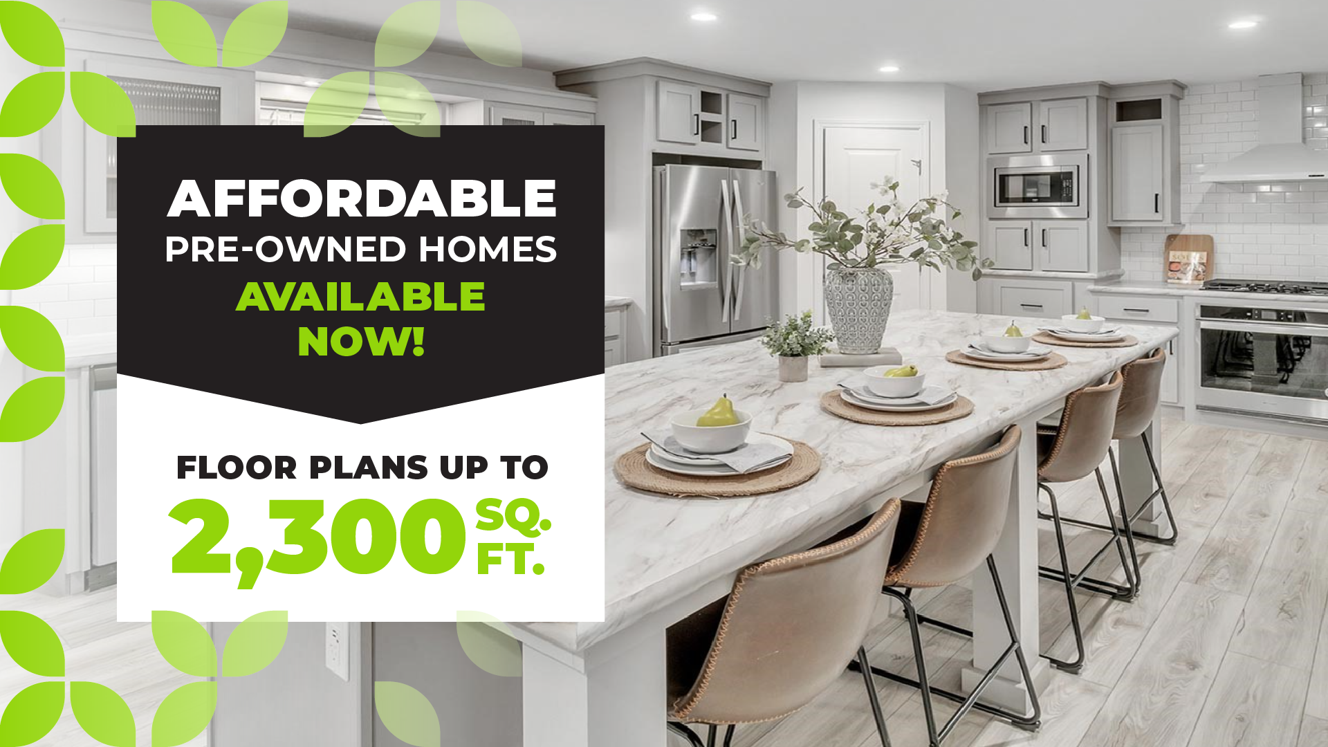 Promotional banner for affordable pre-owned homes, showing a bright, modern kitchen with an island and seating, and text advertising available homes with floor plans up to 2,300 square feet.
